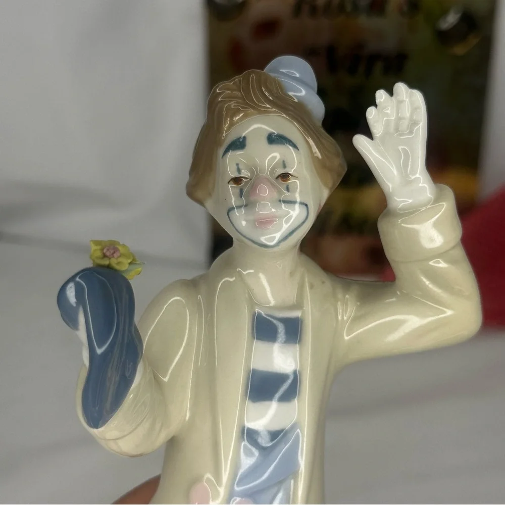 Vintage Paul Sabastian Porcelain Clown Figurine with Flower